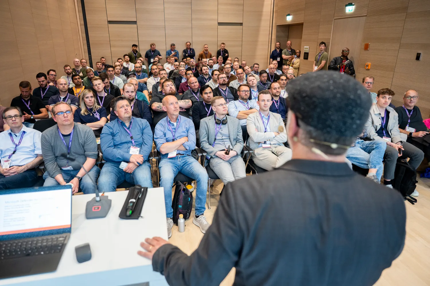 Attendees in a session room at ECS
