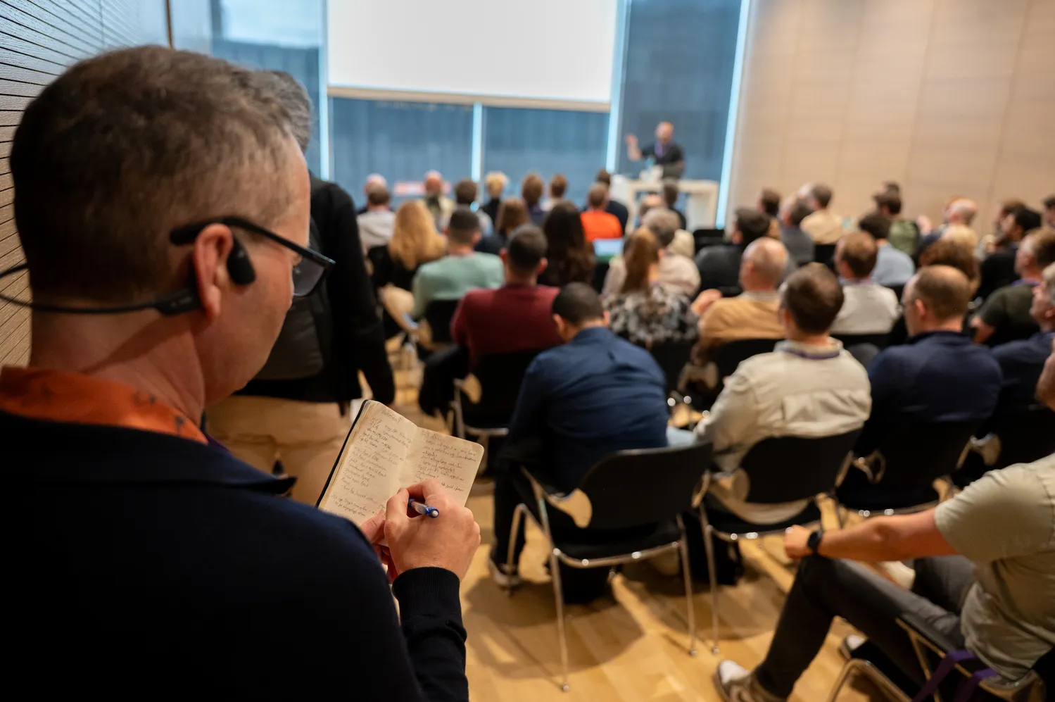 An audience listening to a session