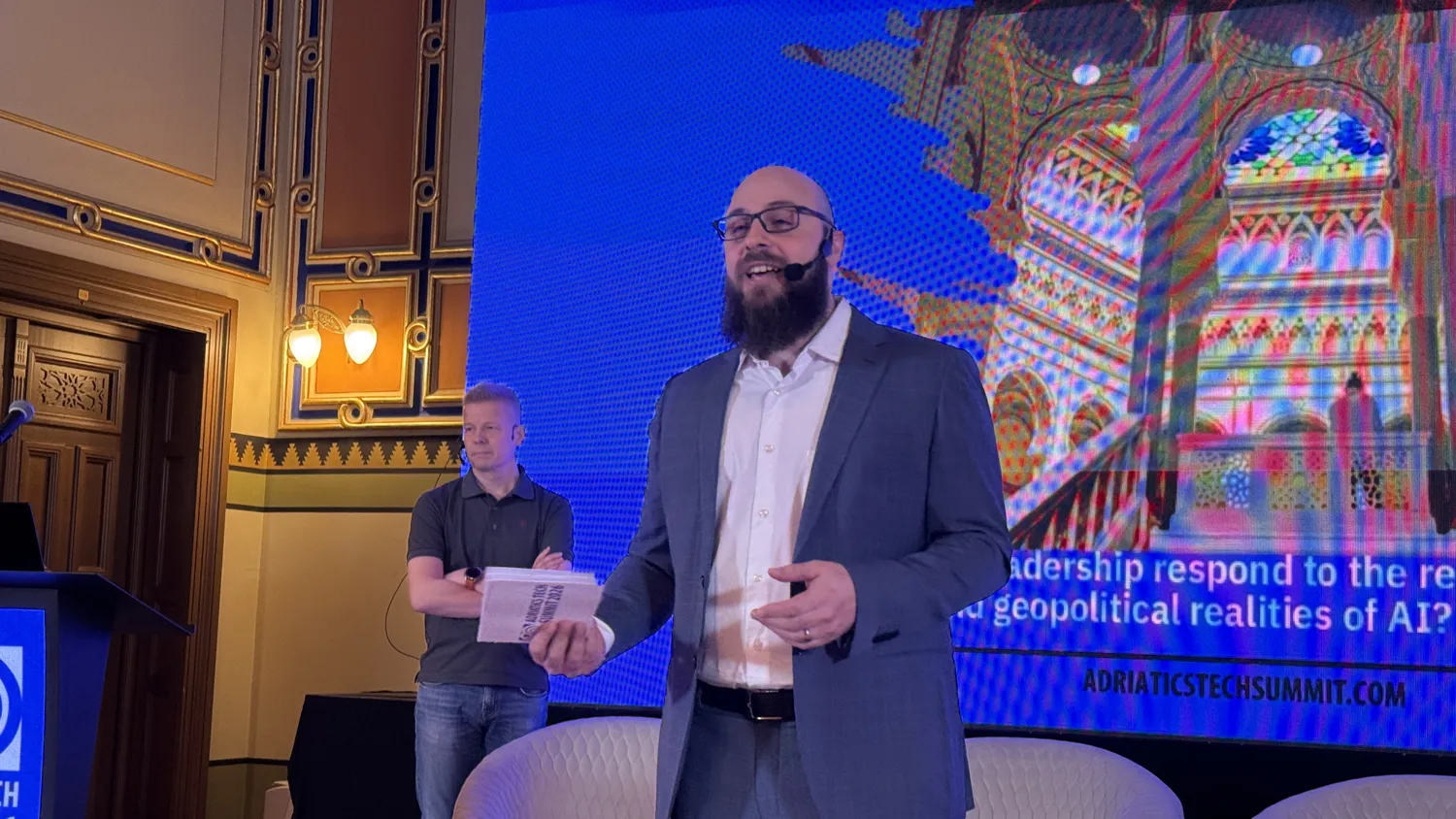 A speaker on stage at the Adriatics Tech Summit