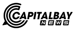 Clean, modern corporate logo featuring stylized text in bold sans-serif font, representing Heidelberg branding. The design includes a distinctive geometric element integrated into the lettering.