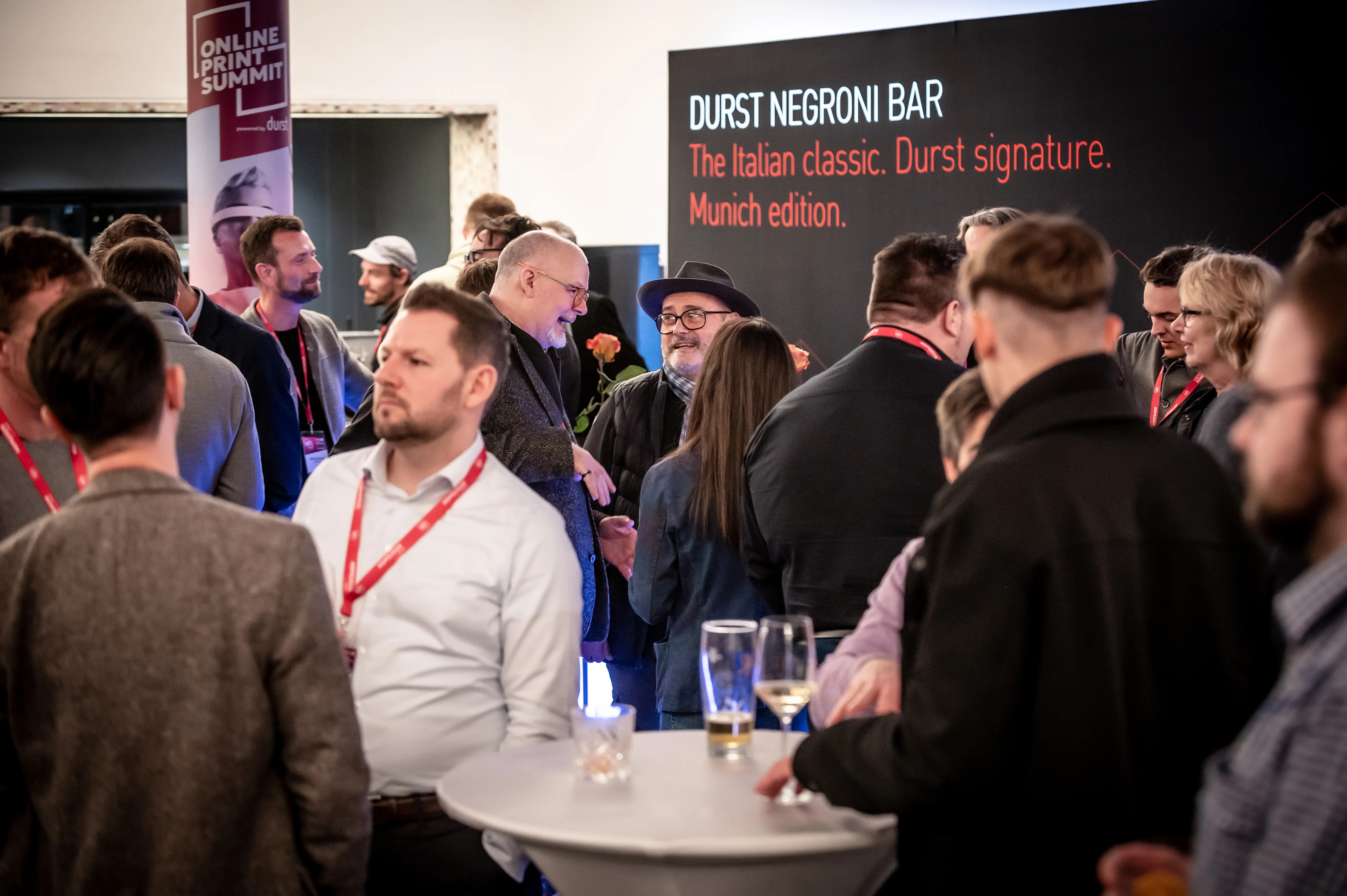 Guests in conversation while networking at the Online Print Summit